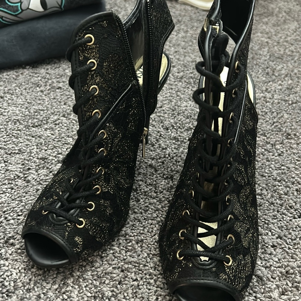 Cosmo black and gold heels
